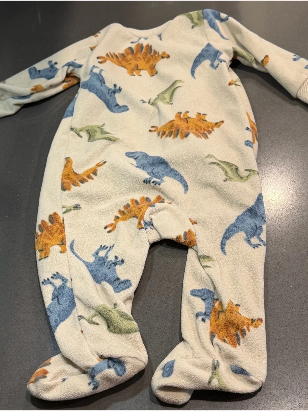 Carter's Cream Fleece One-Piece with Blue, Green, and Orange Dinosaurs